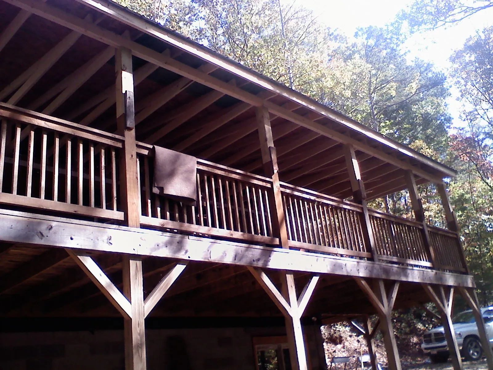 Timber framing under a new elevated porch and deck — Roof Leak Repair in Kodak by Roofing Brothers